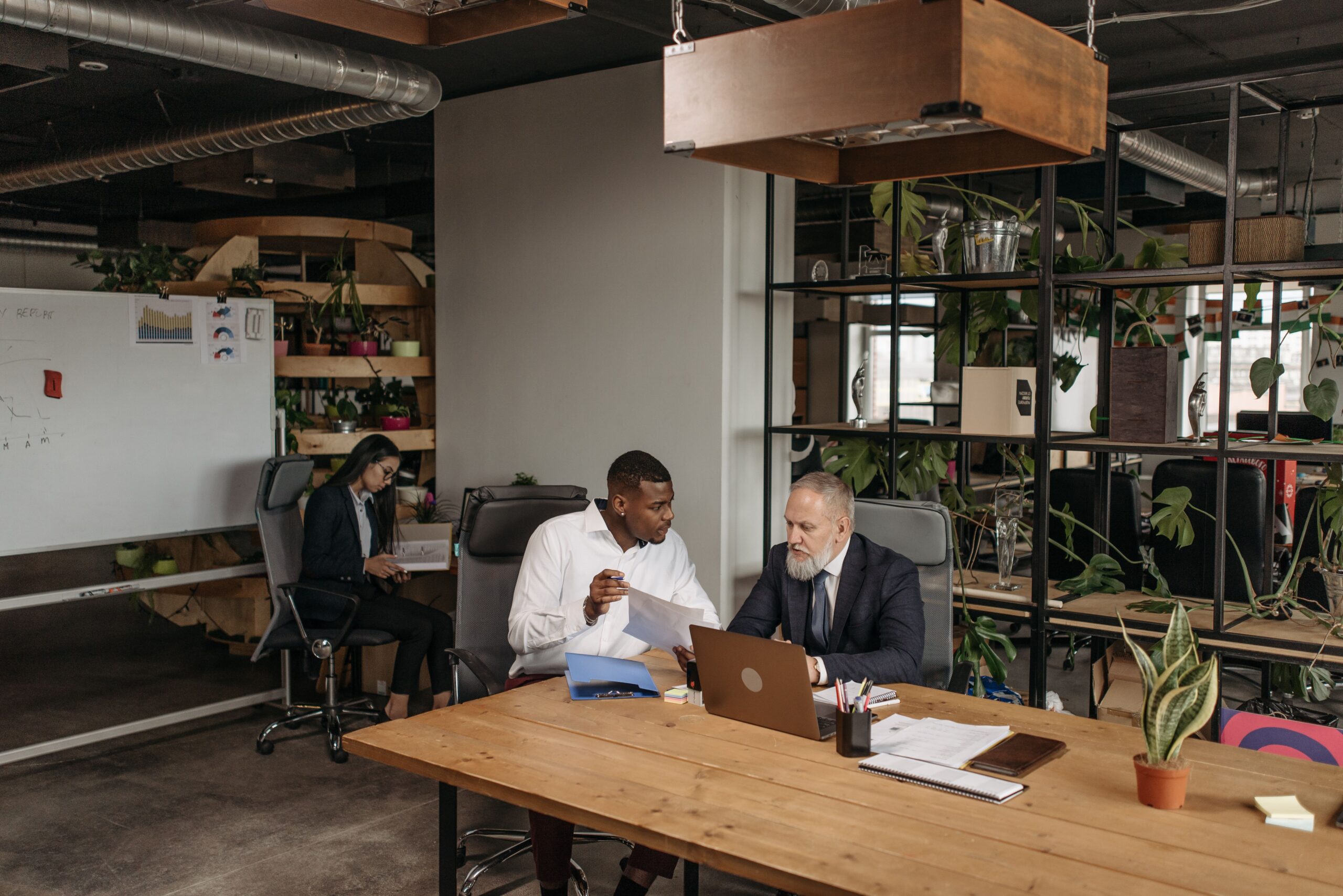 Small business owners reviewing financial documents and lending data featured in the Small Business Health Index for Q2 2026 report.